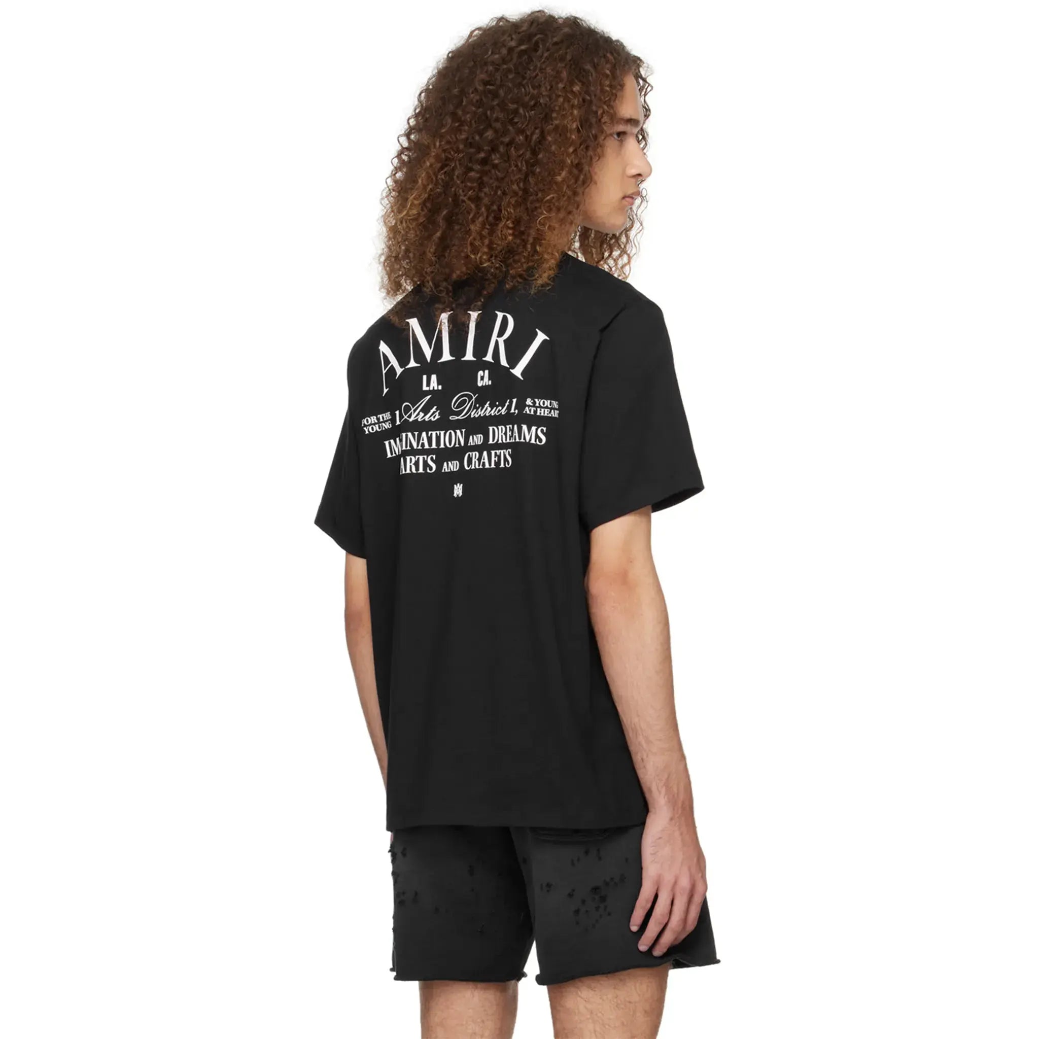 Model back view of Amiri Arts District Black T Shirt PXMJT001-001